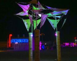 Night lights of See Trees in the 3B Plaza at Burning Man 2019.