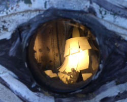 Internal realm with upcycled material recreating a forest.